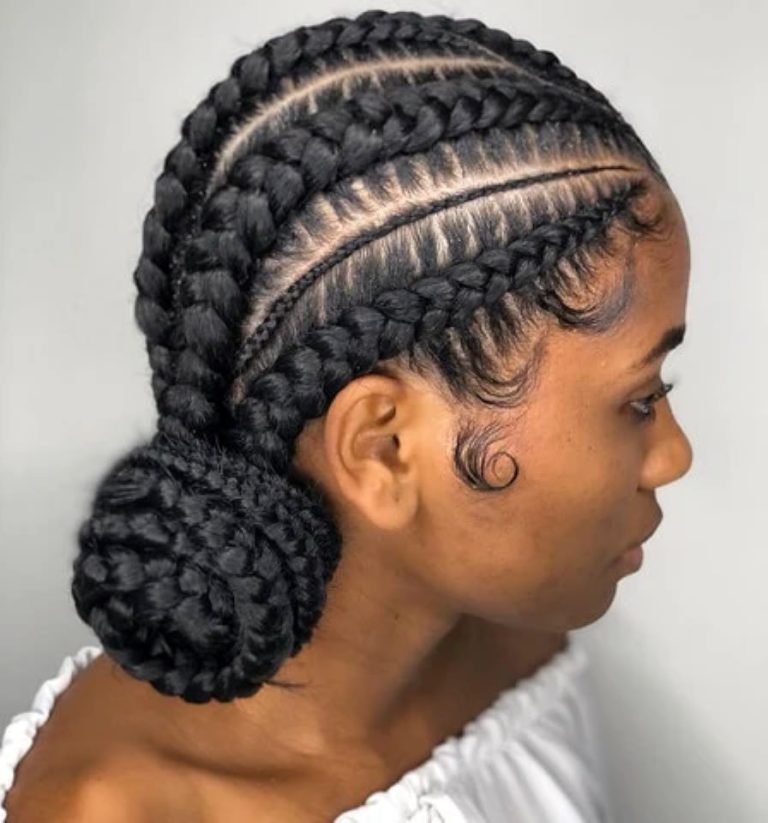 Large Tribal Braids With Low Bun